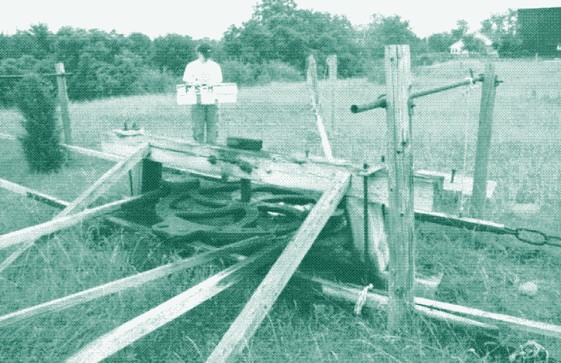 A bull wheel in Oil Springs, Ontario. Source: "Conservation district study appendix", Oil Heritage Conservation District Plan, The Corporation of the County of Lambton.