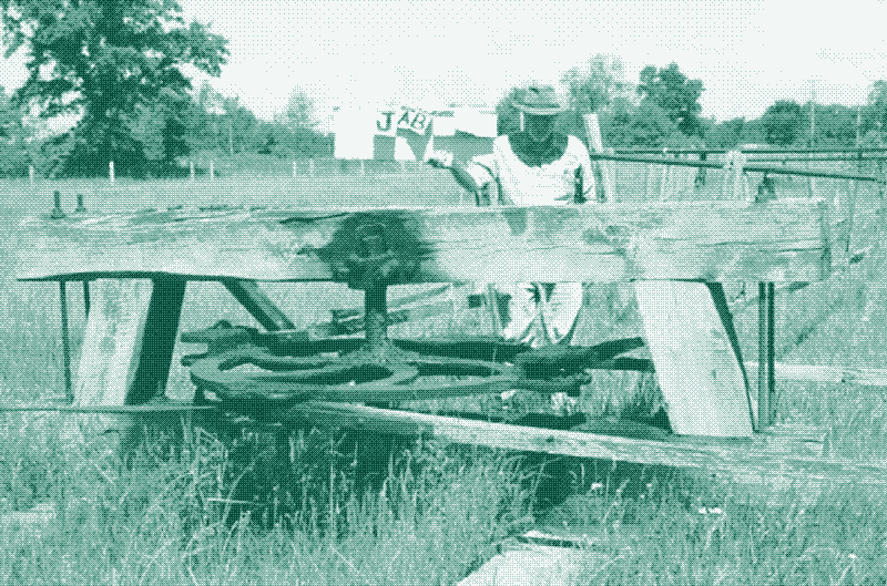 A field wheel in Oil Springs, Ontario. Source: "Conservation district study appendix", Oil Heritage Conservation District Plan, The Corporation of the County of Lambton.