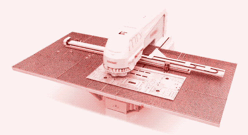 Image: A CNC turret punching machine is nibbling sheet metal. Euromac