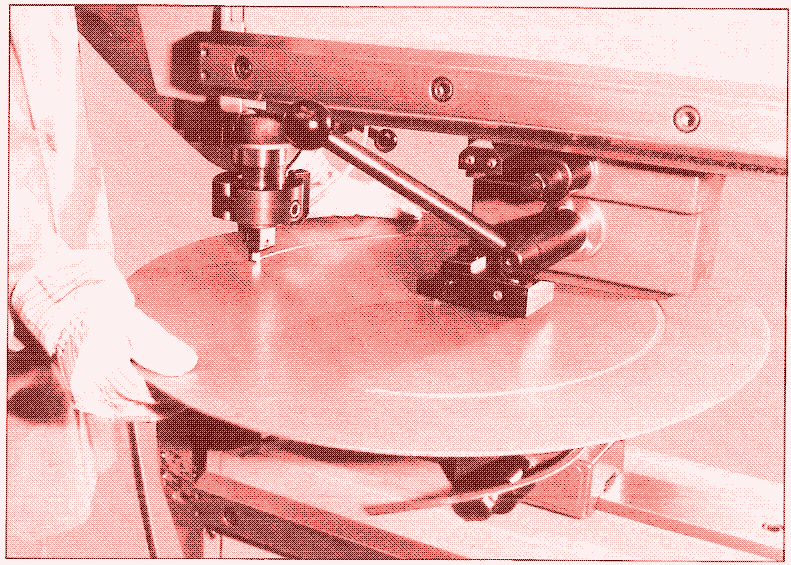 Electrically powered, hand-controlled punching machine. From a 1980s Trumpf catalogue.