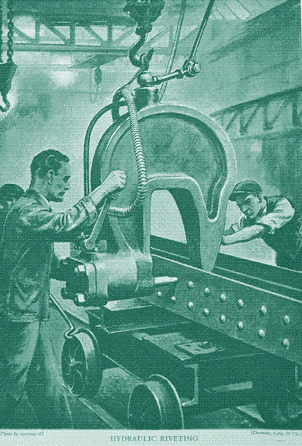 Hydraulically powered riveting machine.