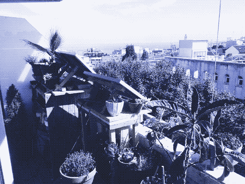 Image: Two small-scale solar systems (100 watts and 30 watts) on the balcony. Photo by Kris De Decker.