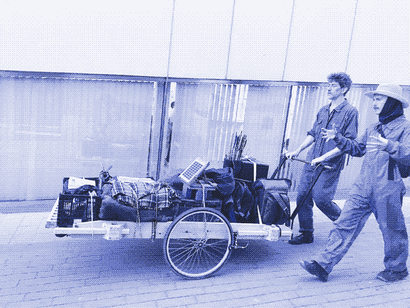 Image: Driving the handcart. Photo by Linda Osusky.