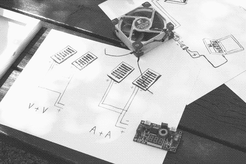 Connecting solar panels in series and parallel. Photo by Marie Verdeil.