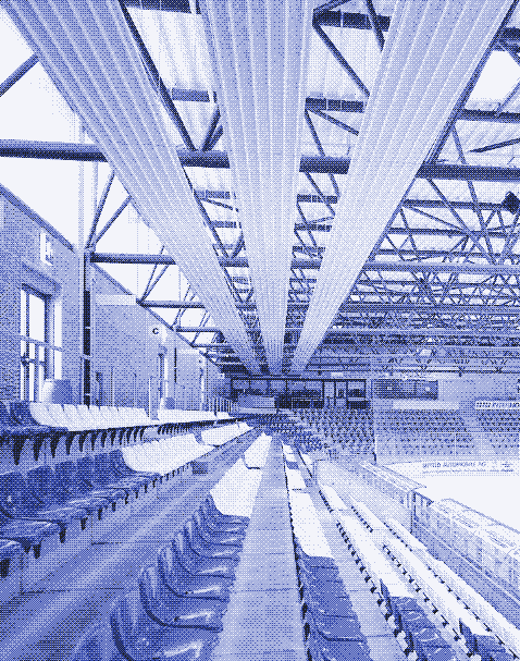 Paneles radiantes de calentamiento y enfriamiento hidrónicos orientados hacia los espectadores es un salón para deportes. Fuente: [Zehnder ZBN](http://www.buildingservicesindex.co.uk/entry/34230 Zehnder/Zehnder-ZBN-radiant-ceiling-panels/#description-block).